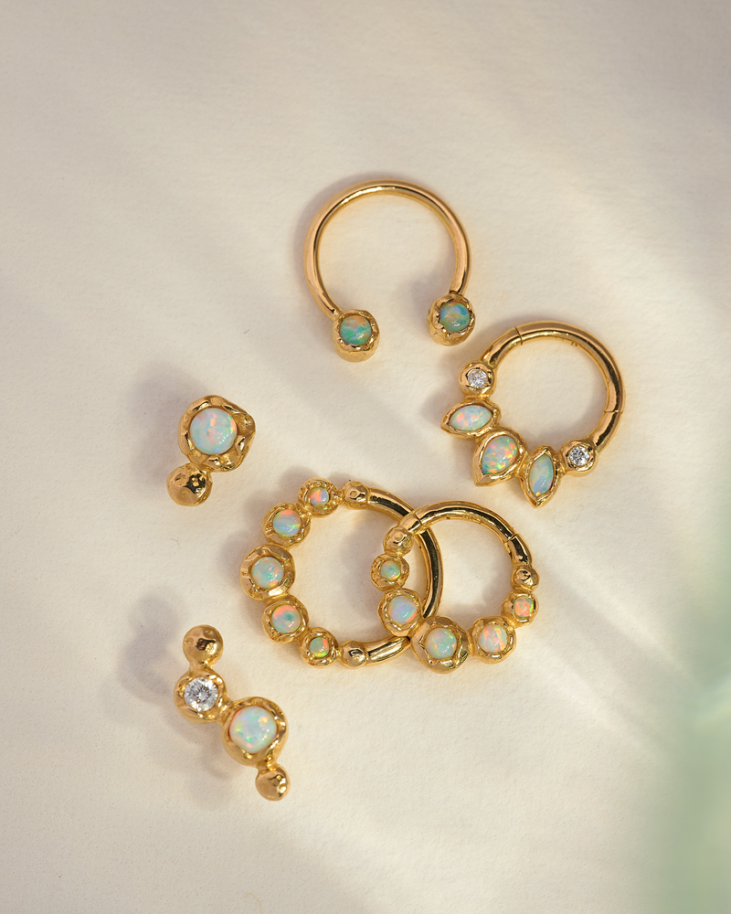 opal gold ear piercings