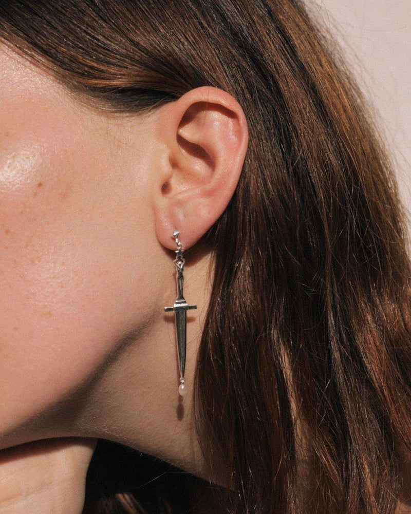 silver dagger earring with a pearl by pamela love