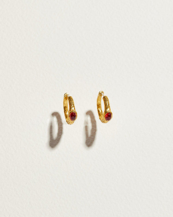 gold plate hoop earrings with red glass