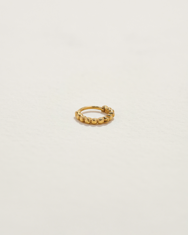 gold infinity huggie earring