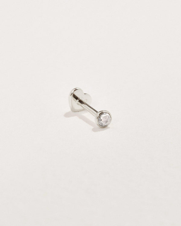 petite stud piercing with diamond and white gold