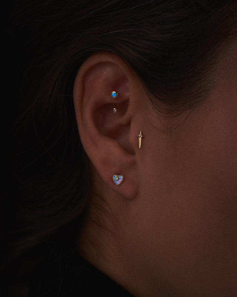 diamond heart stud earring on the model