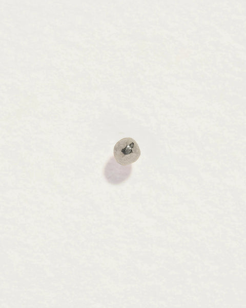 14K gold molten stud earring with a textured dome, shown from the front