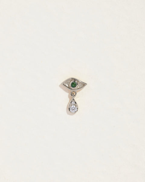 Crying eye stud with a green emerald and dangling teardrop design, front view