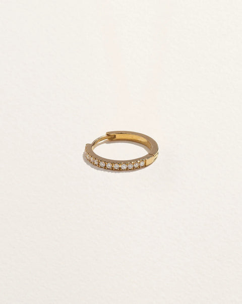 10mm Pavé Huggie by Pamela Love – Piercing in #product_material# (#product_color#).  10mm-pave-huggie-ii