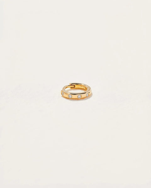 6mm Dot Huggie by Pamela Love – Piercing in #product_material# (#product_color#).  6mm-diamond-dot-huggie