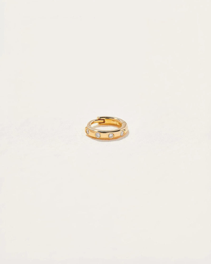 6mm Dot Huggie by Pamela Love – Piercing in #product_material# (#product_color#). 