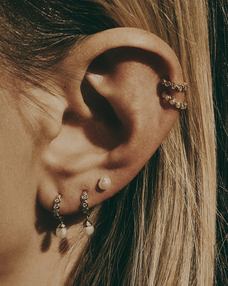 6mm Molten Eternity Huggie by Pamela Love – Piercing in #product_material# (#product_color#). 