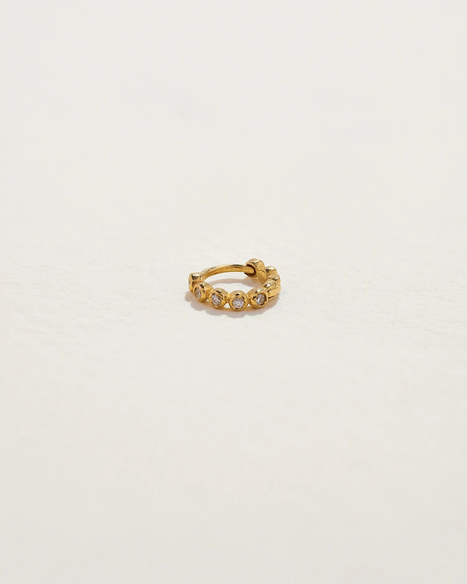 6mm Molten Eternity Huggie by Pamela Love – Piercing in #product_material# (#product_color#). 