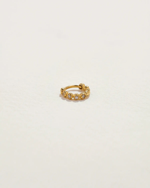 6mm Molten Eternity Huggie by Pamela Love – Piercing in #product_material# (#product_color#). 