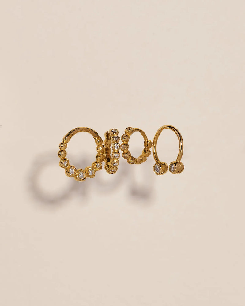 6mm Molten Eternity Huggie by Pamela Love – Piercing in #product_material# (#product_color#). 