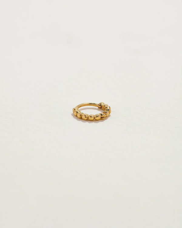 6mm Molten Eternity Huggie by Pamela Love – Piercing in #product_material# (#product_color#). 