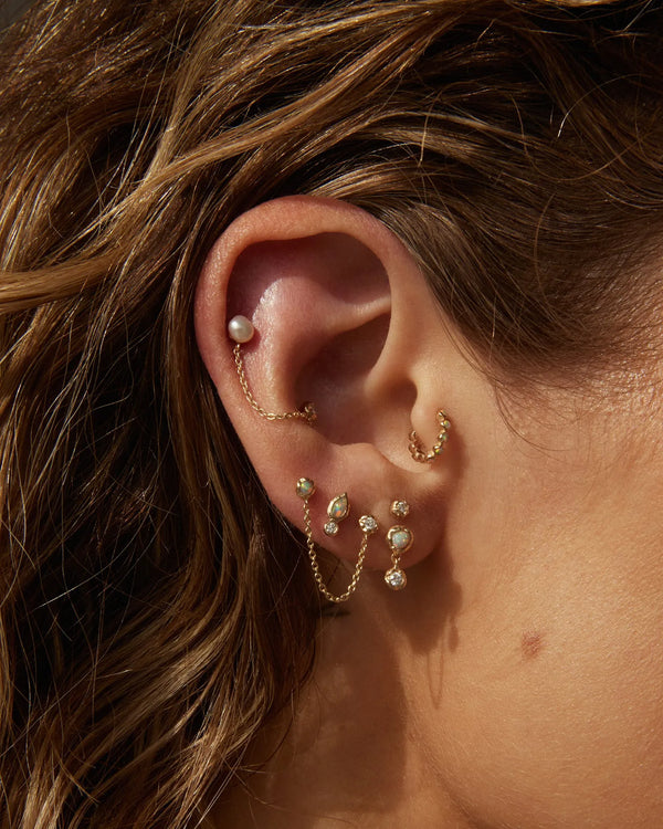 6mm Molten Eternity Huggie by Pamela Love – Piercing in #product_material# (#product_color#). 