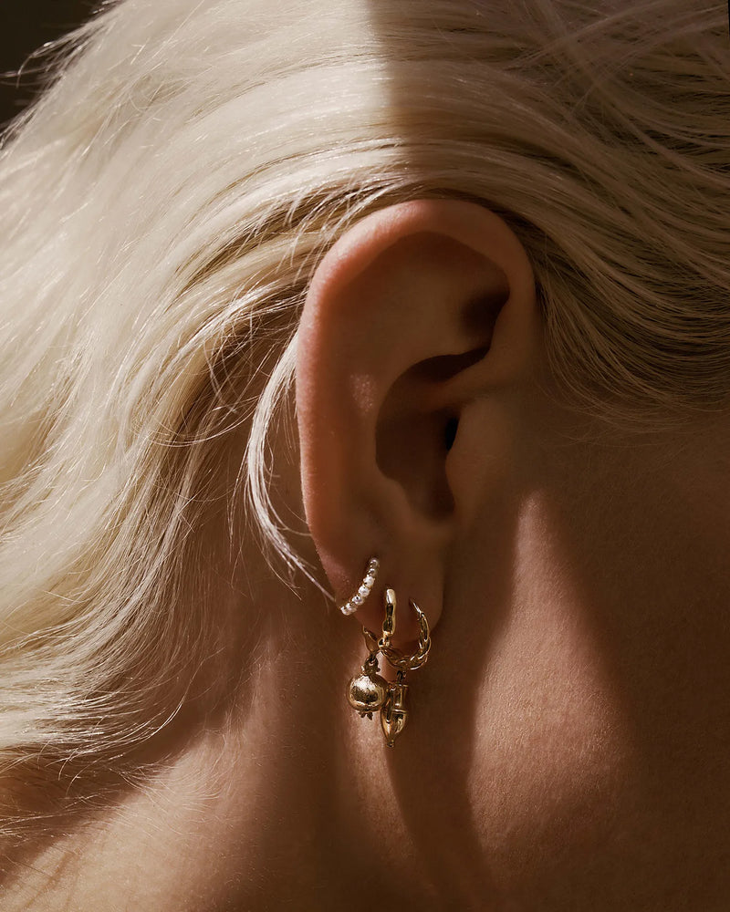 6mm Pavé Huggie by Pamela Love – Piercing in #product_material# (#product_color#). 