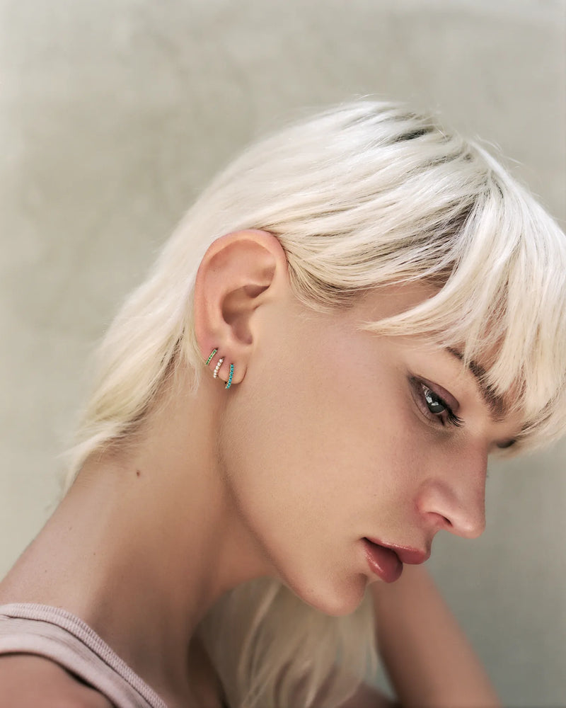 6mm Pavé Huggie by Pamela Love – Piercing in #product_material# (#product_color#). 