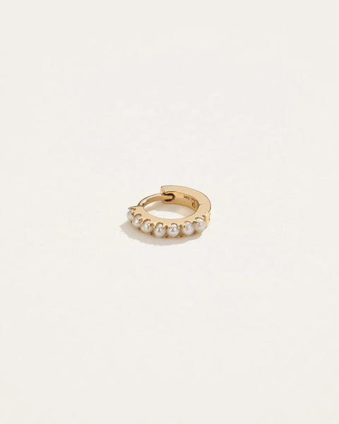 6mm Pavé Huggie by Pamela Love – Piercing in #product_material# (#product_color#).  6mm-pave-huggie-gold-pearl-white