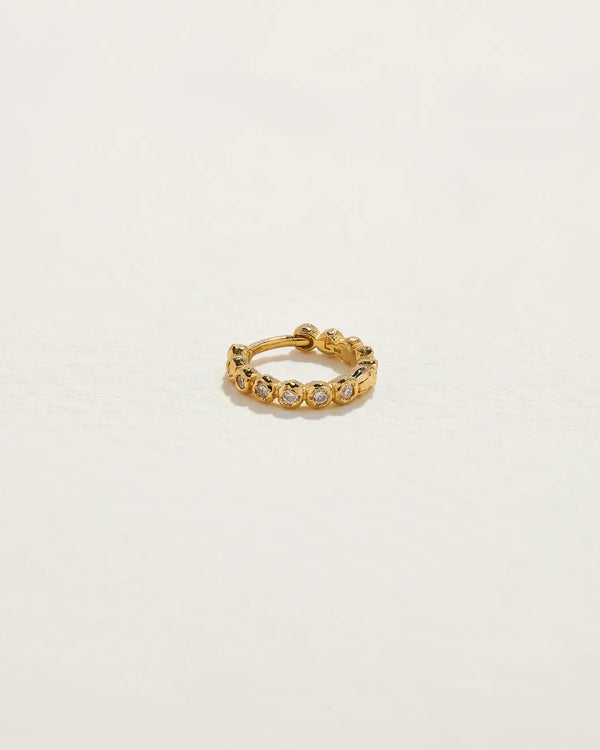 8mm Molten Eternity Huggie by Pamela Love – Piercing in #product_material# (#product_color#). 