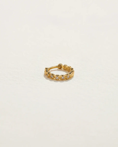 8mm Molten Eternity Huggie by Pamela Love – Piercing in #product_material# (#product_color#).  8mm-molten-eternity-huggie-diamond