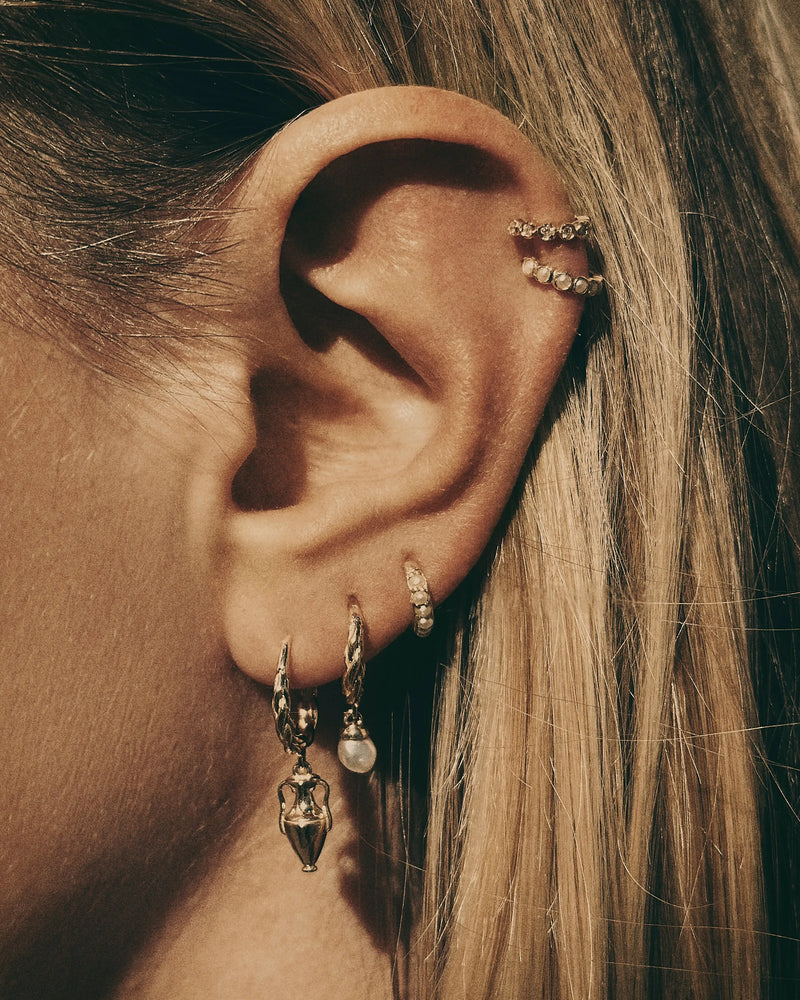 8mm Molten Pavé Huggie by Pamela Love – Piercing in #product_material# (#product_color#). 