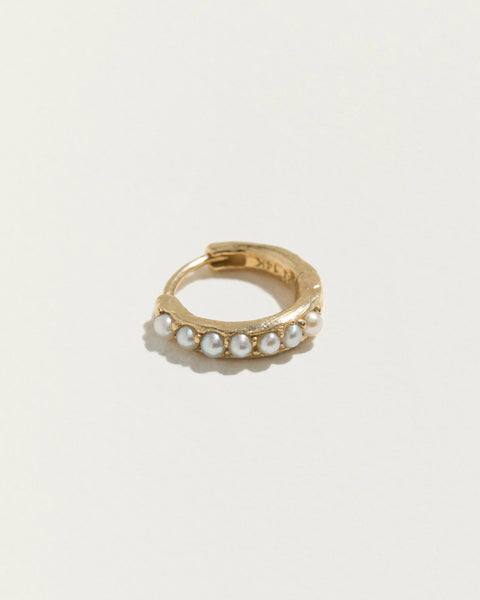 8mm Molten Pavé Huggie by Pamela Love – Piercing in #product_material# (#product_color#). 