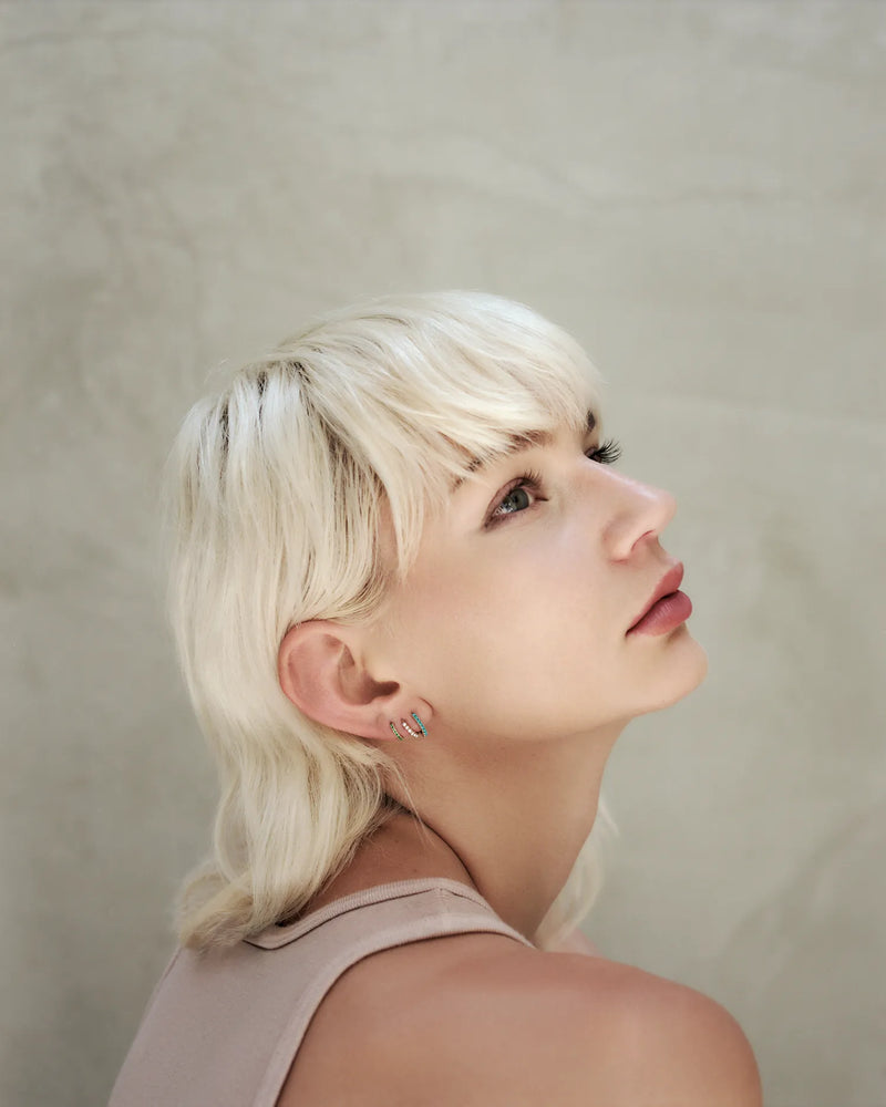 8mm Pavé Huggie by Pamela Love – Piercing in #product_material# (#product_color#). 