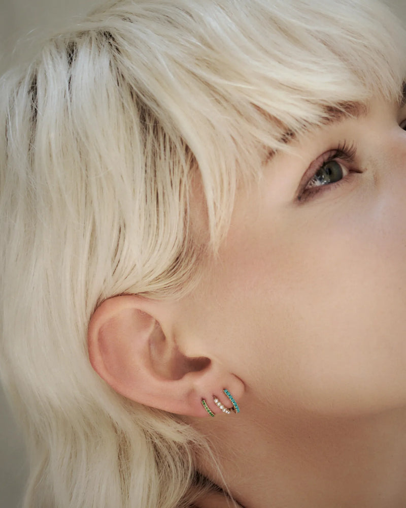 8mm Pavé Huggie by Pamela Love – Piercing in #product_material# (#product_color#). 