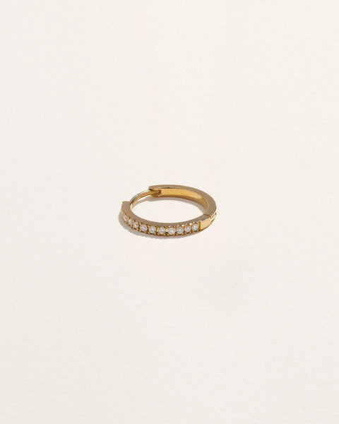 8mm Pavé Huggie by Pamela Love – Piercing in #product_material# (#product_color#). 