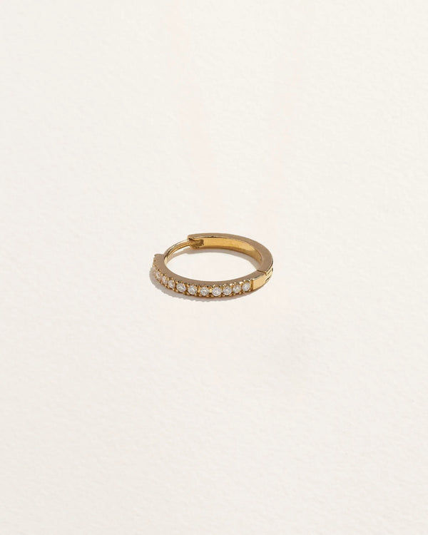 8mm Pavé Huggie by Pamela Love – Piercing in #product_material# (#product_color#). 