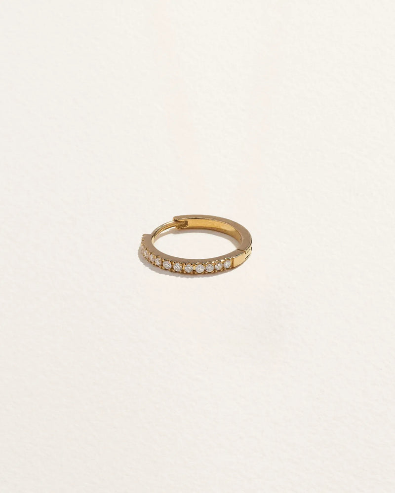 8mm Pavé Huggie by Pamela Love – Piercing in #product_material# (#product_color#). 