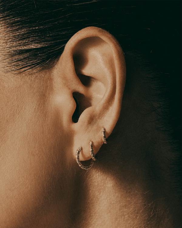 8mm Pavé Rope Huggies by Pamela Love – Piercing in #product_material# (#product_color#). 