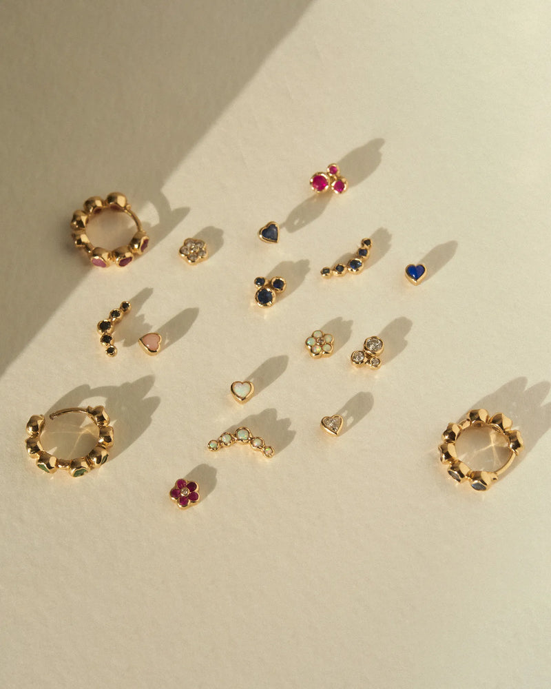 Bezel Flower Stud by Pamela Love – Piercing in #product_material# (#product_color#). 