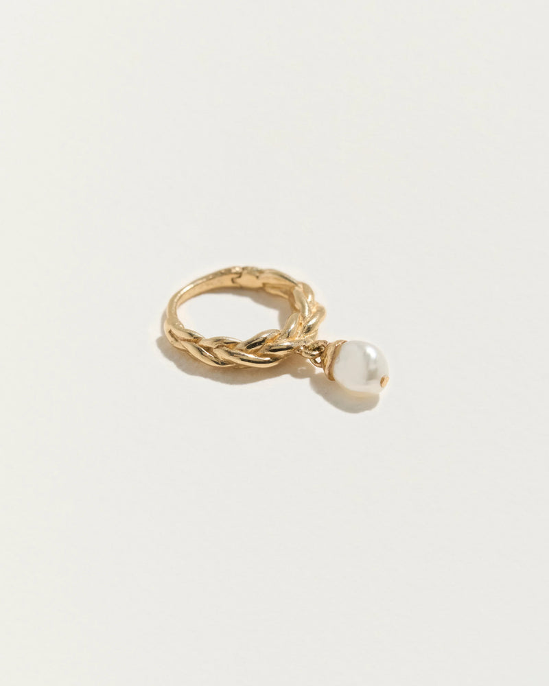 Braided Baroque Huggie by Pamela Love – Piercing in #product_material# (#product_color#). 