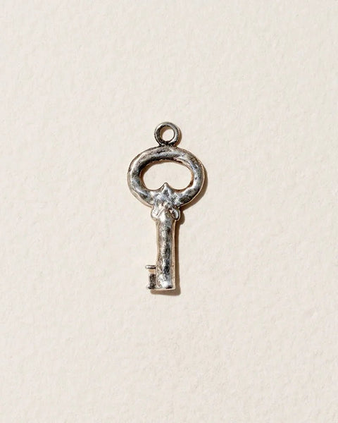 Fini’s Key Charm by Pamela Love – Charm in #product_material# (#product_color#). 
