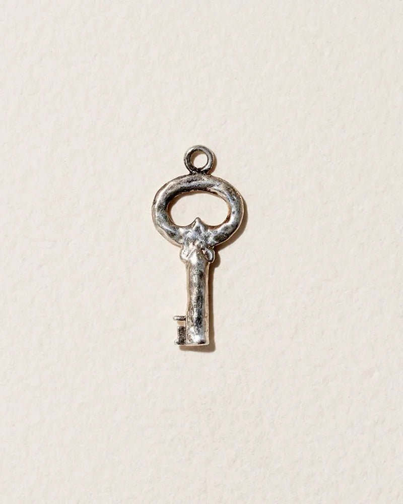 Fini’s Key Charm by Pamela Love – Charm in #product_material# (#product_color#). 