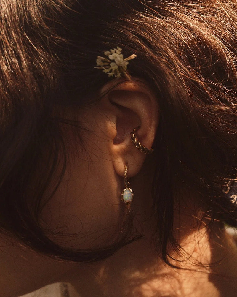 Hand Carved Huggie by Pamela Love – Piercing in #product_material# (#product_color#). 