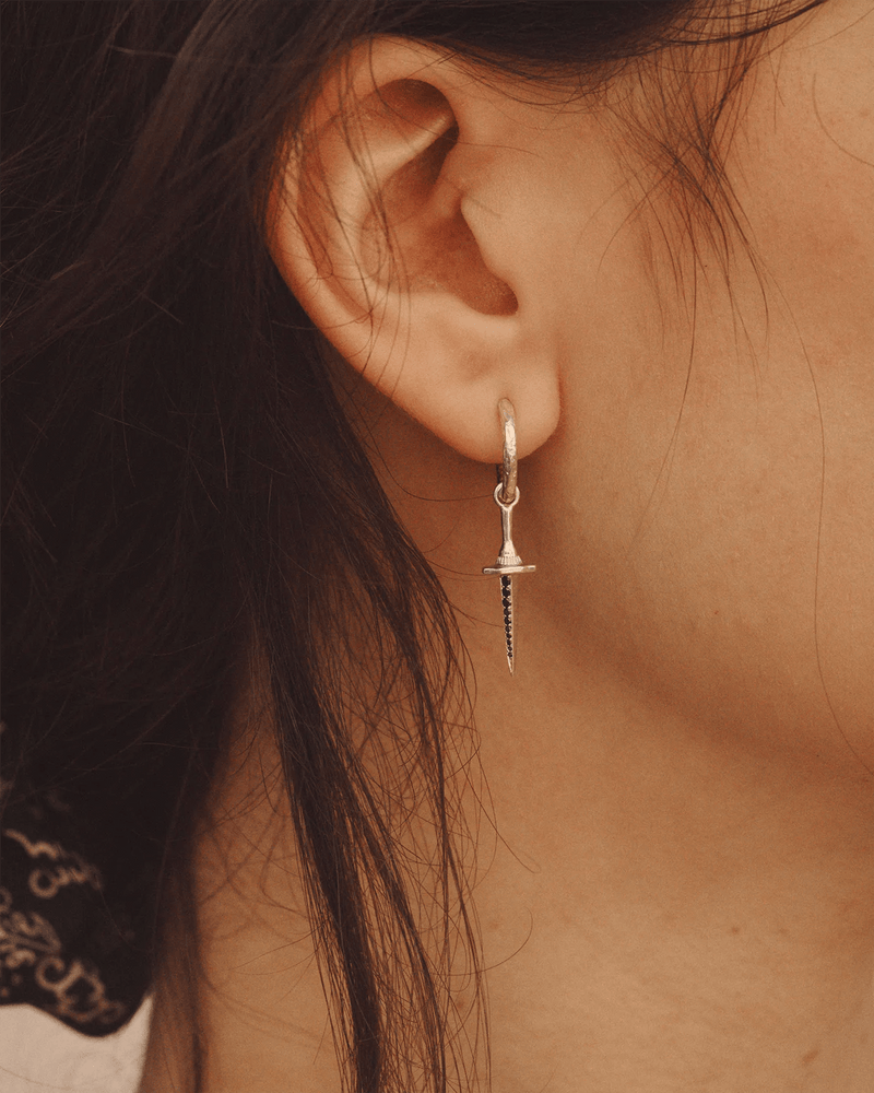 Hand Carved Huggie by Pamela Love – Piercing in #product_material# (#product_color#). 