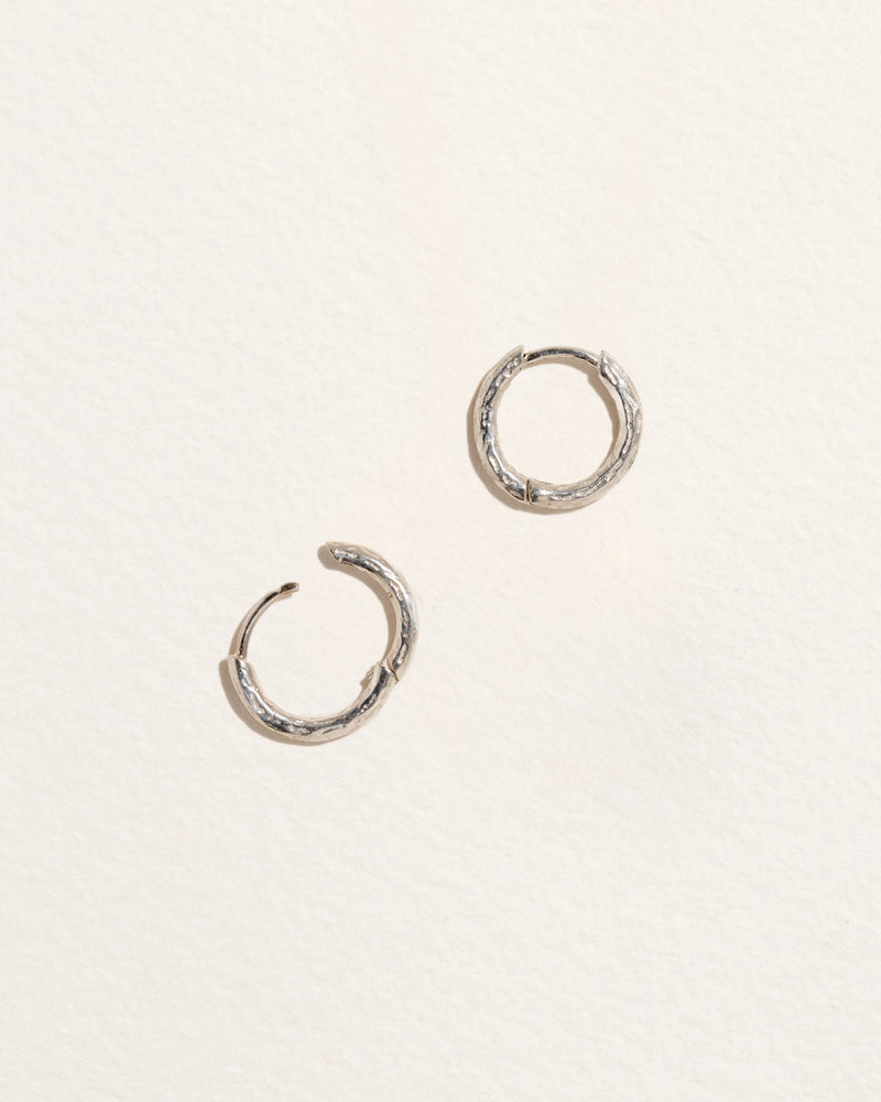 Hand Carved Huggie by Pamela Love – Piercing in #product_material# (#product_color#). 