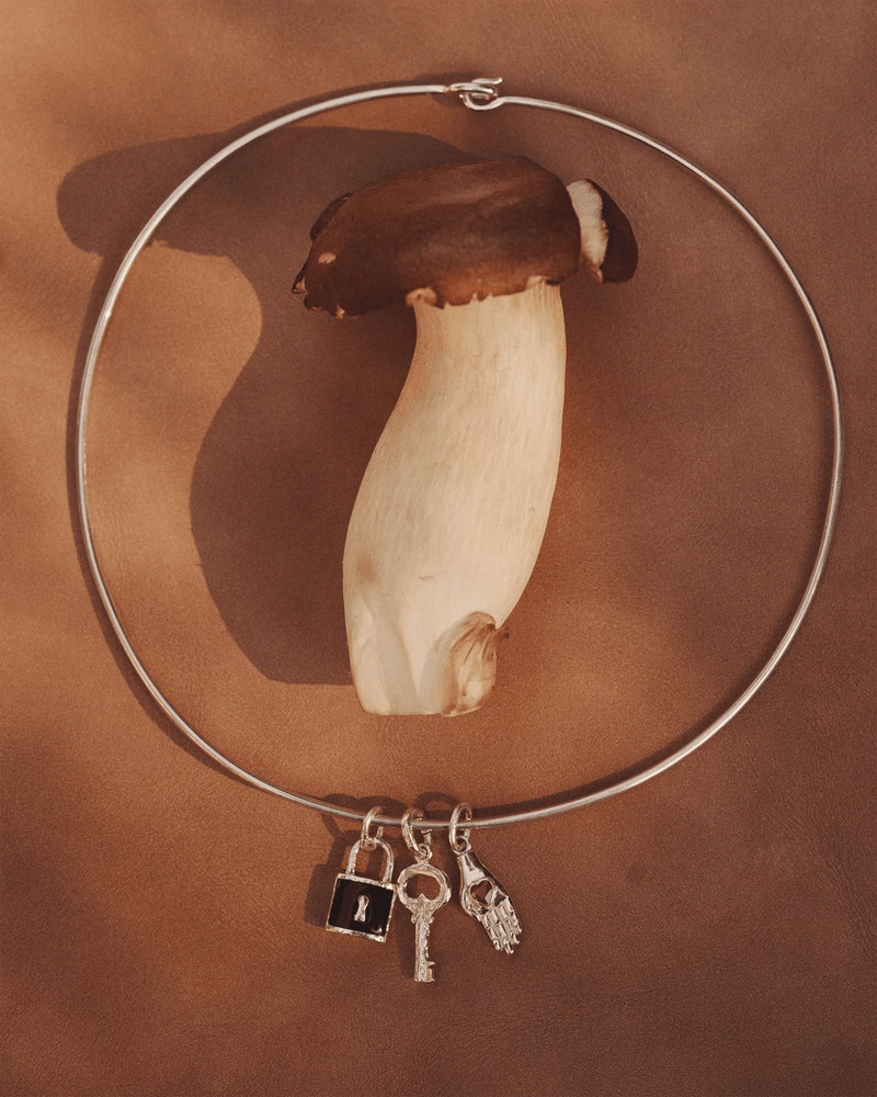 Heart in Hand Charm by Pamela Love – Charm in #product_material# (#product_color#). 