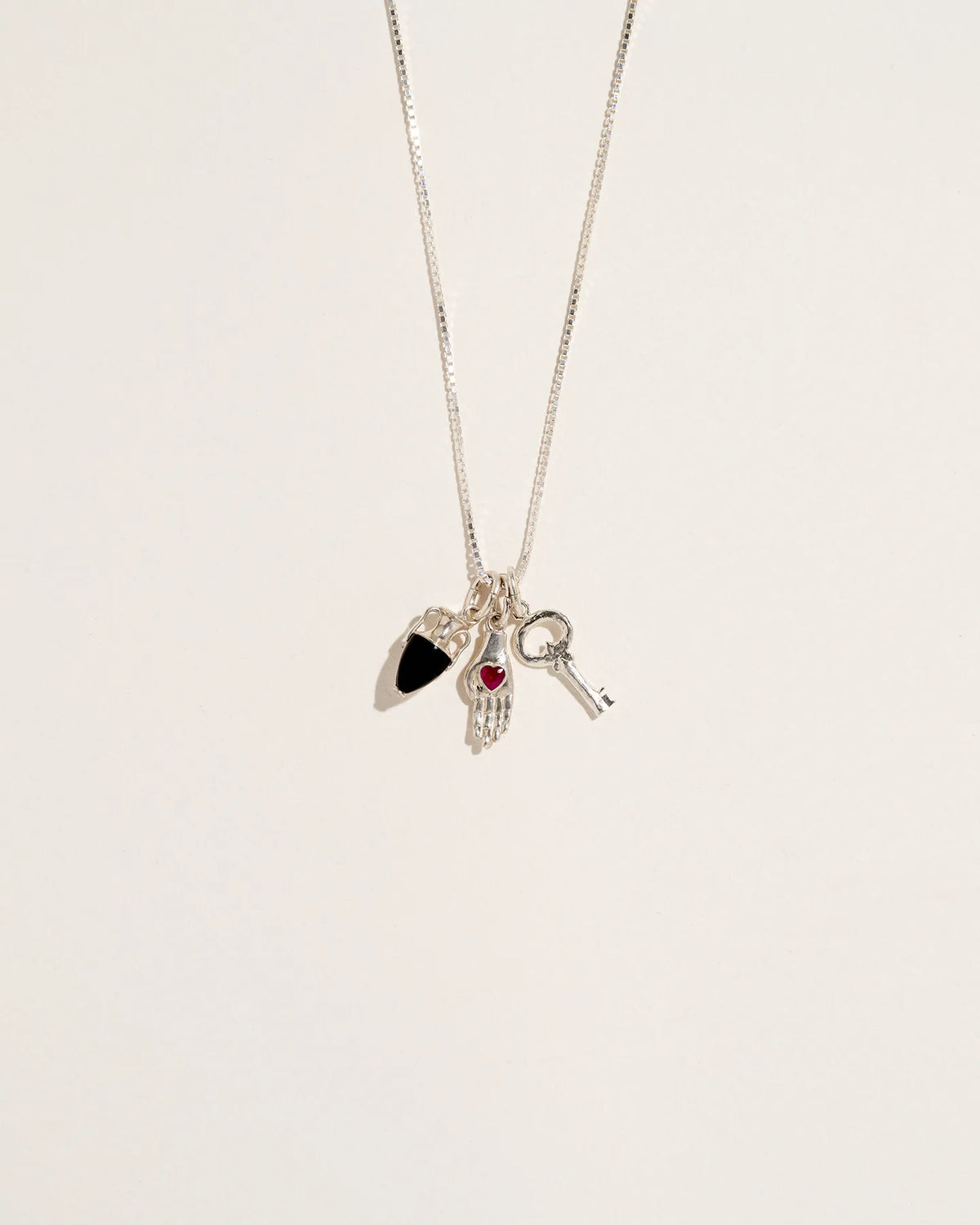 Heart in Hand Charm – Pamela Love Heart in Hand Charm – Pamela Love