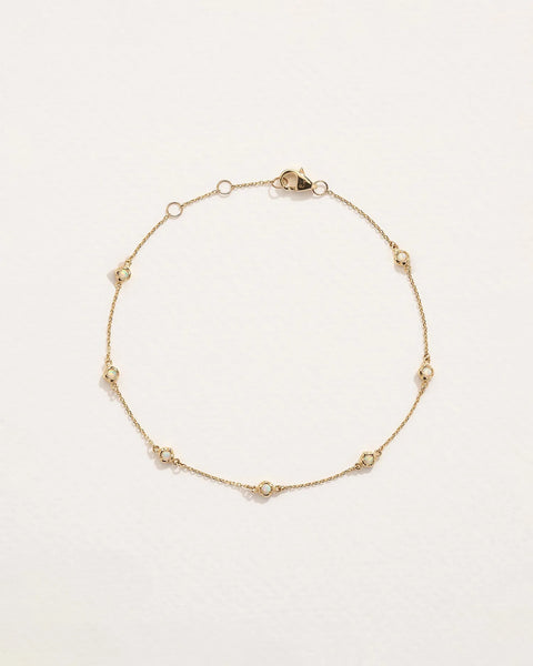 Molten Anklet by Pamela Love – Anklets in #product_material# (#product_color#).  molten-bezel-station-anklet-gold-opal-white