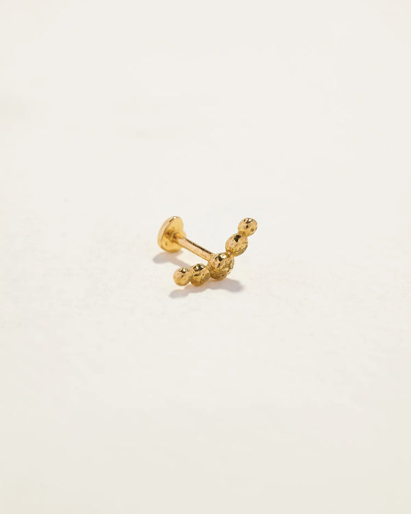 Molten Crescent Stud by Pamela Love – Piercing in #product_material# (#product_color#). 