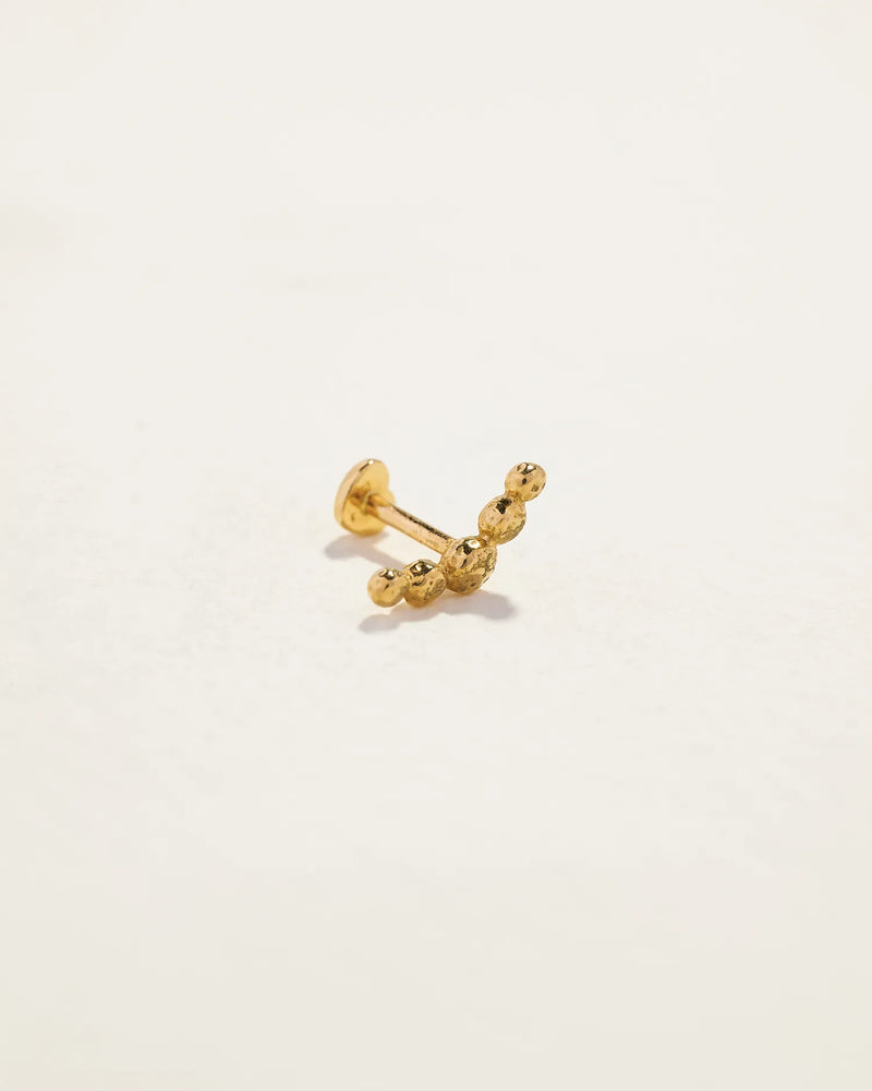 Molten Crescent Stud by Pamela Love – Piercing in #product_material# (#product_color#). 