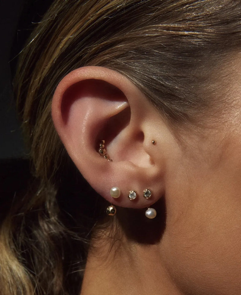 Molten Crescent Stud by Pamela Love – Piercing in #product_material# (#product_color#). 