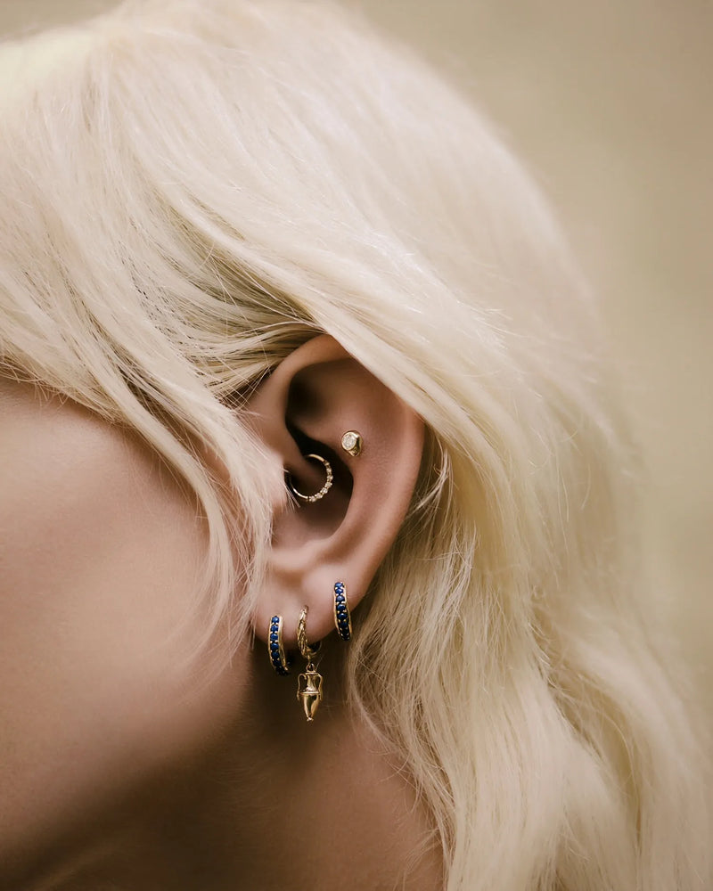 8mm Molten Pavé Huggie by Pamela Love – Piercing in #product_material# (#product_color#). 