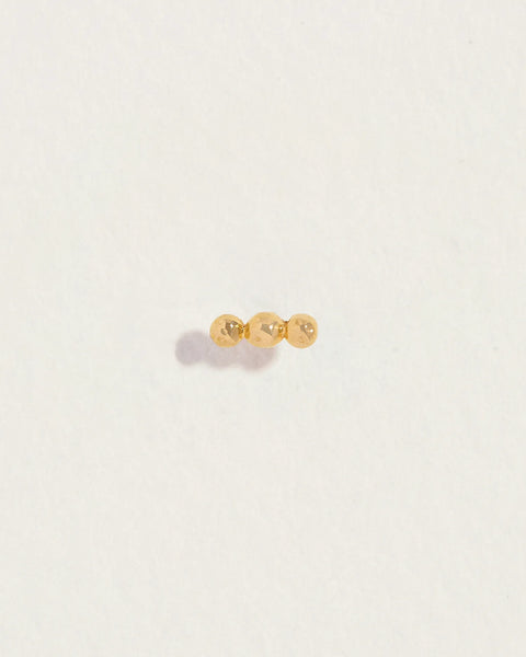 Molten Triple Dot Stud by Pamela Love – Piercing in #product_material# (#product_color#). 