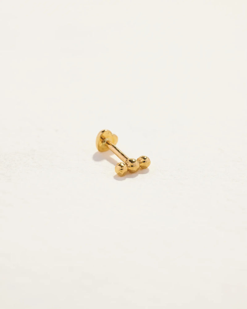 Molten Triple Dot Stud by Pamela Love – Piercing in #product_material# (#product_color#). 