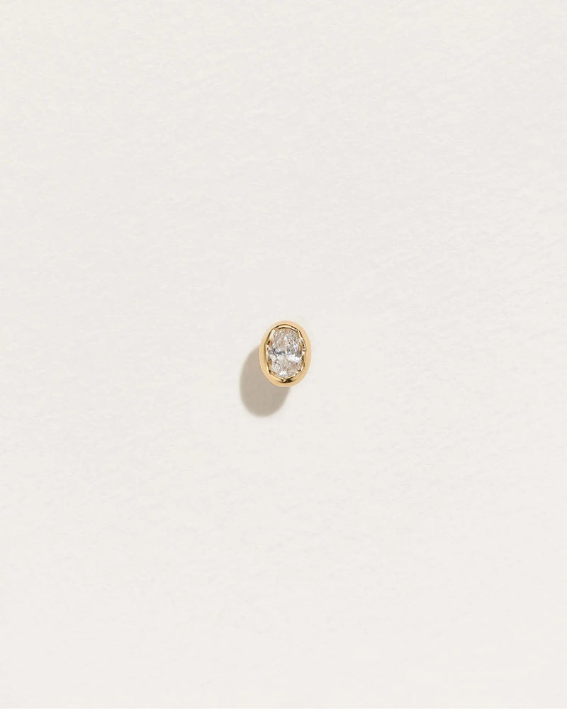 Nugget Stud by Pamela Love – Piercing in #product_material# (#product_color#). 