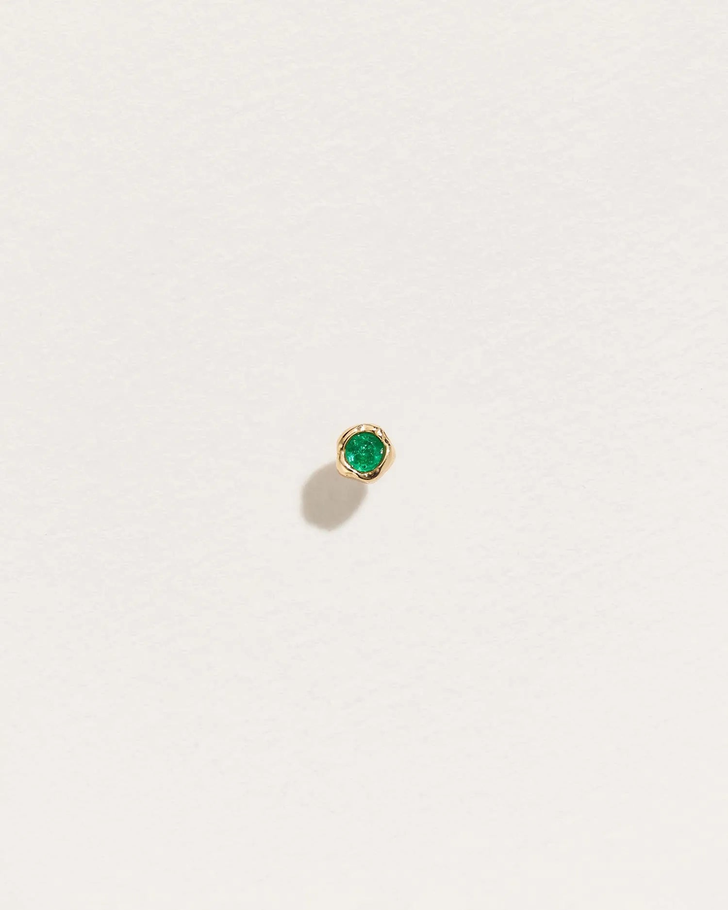 Petite Nugget Stud by Pamela Love – Piercing in #product_material# (#product_color#).  petite-nugget-stud-gold-emerald-green