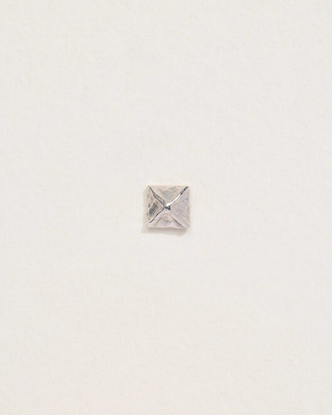 Pyramid Stud by Pamela Love – Piercing in #product_material# (#product_color#). 