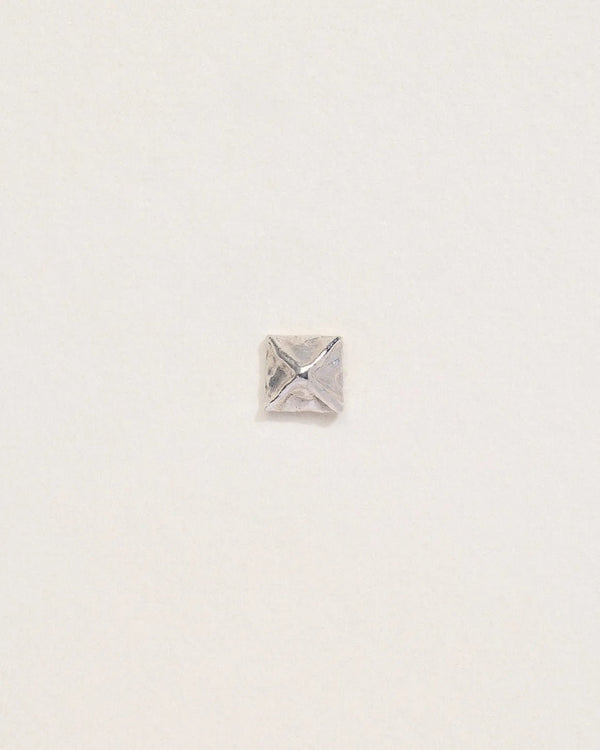 Pyramid Stud by Pamela Love – Piercing in #product_material# (#product_color#). 